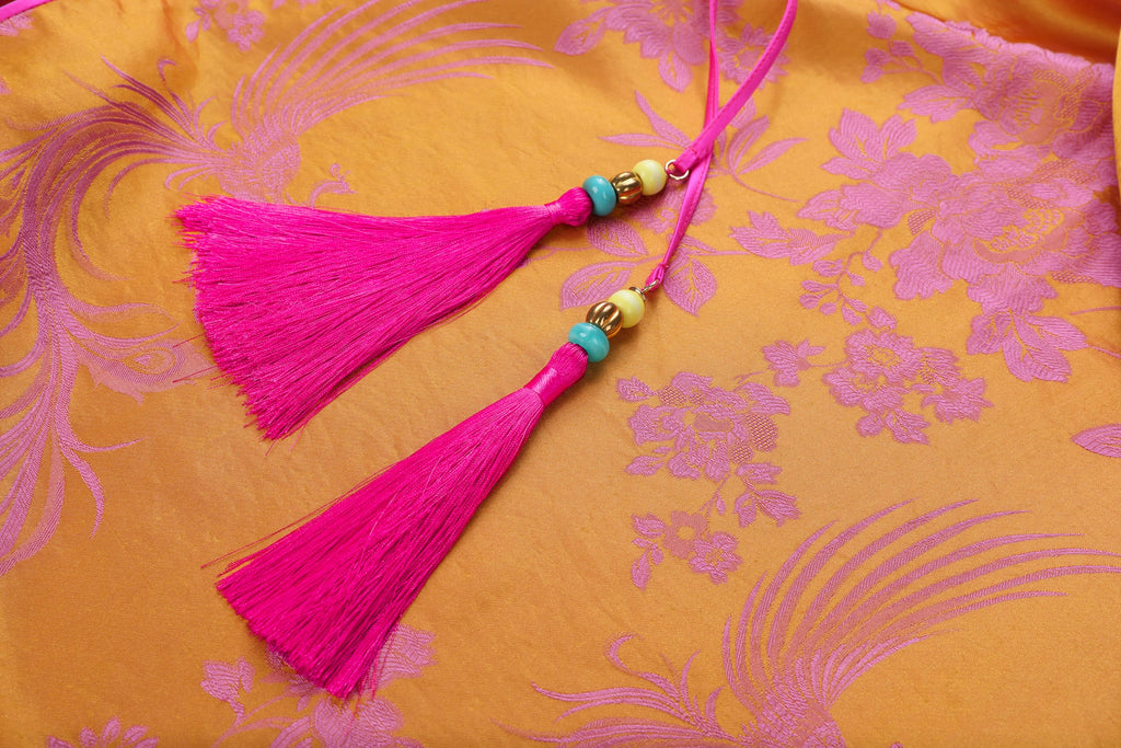 Chinese Silky Phoenix Brocade Abaya (Neon Pink) — close-up of pink tassels and coloured beads