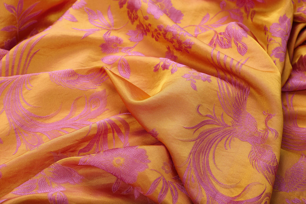 Chinese Silky Phoenix Brocade Abaya (Neon Pink) — draped brocade showing pink motifs and a lustrous surface